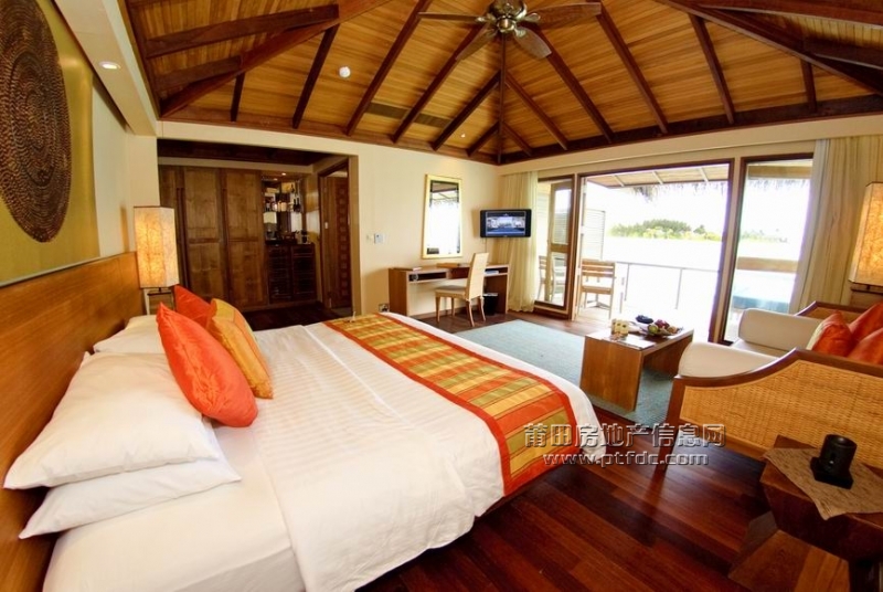 Over-Water Bungalow bedroom.jpg